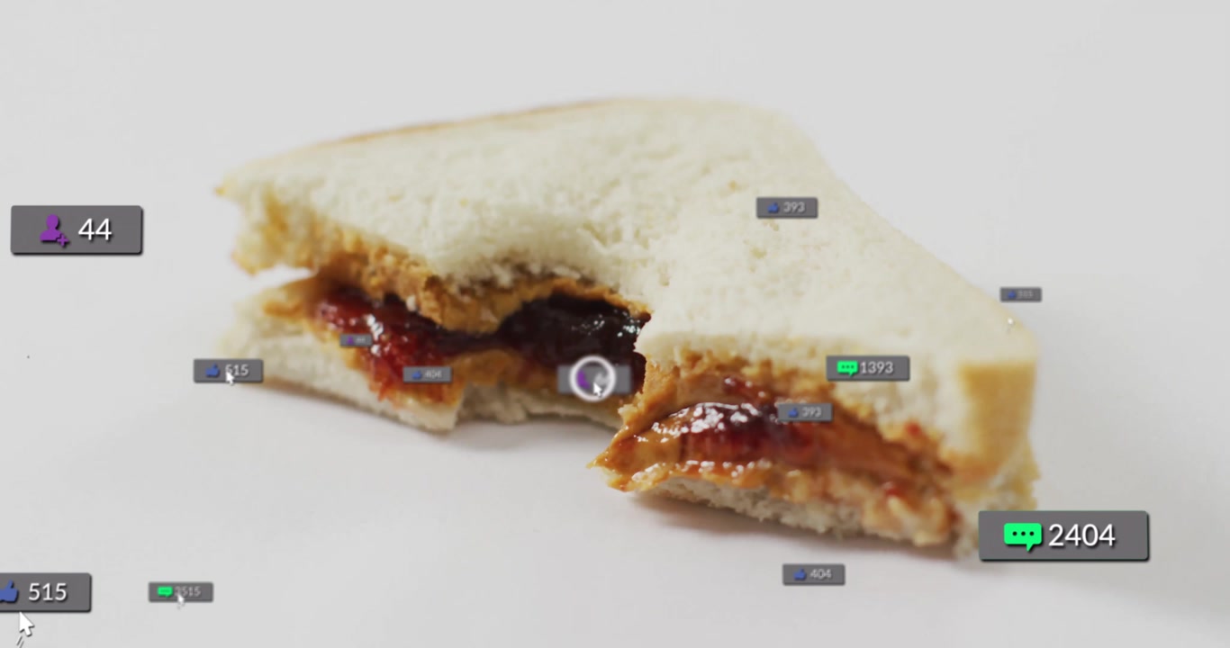 upon close-up sandwich resting on white surface icons fading, drifting, rising, showing engagement