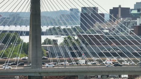 Tight-drone-shot-of-cars-driving-across-the-Leonard-P