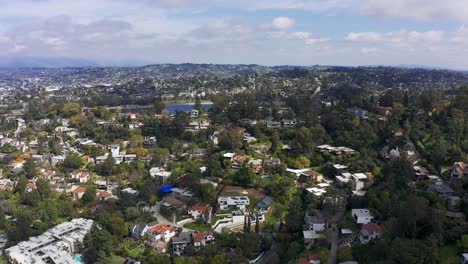 Descending-and-panning-aerial-shot-of-the-hills-of-Silver-Lake-in-Los-Angeles,-California