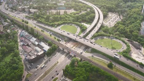 aerial view of city car traffic drive on roundabout road junction, modern urban transportation concept