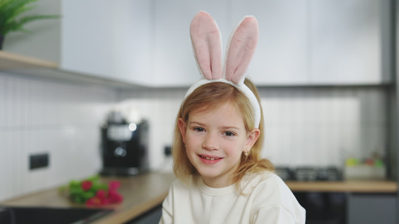 Girl with Easter Bunny Ears in Kitchen