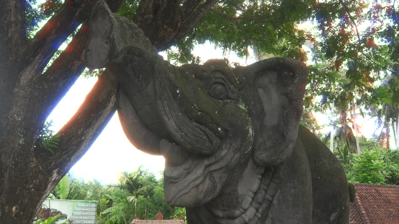 Elephant stone carving statue art at Goa Gajah Hindu Balinese temple Ubud Bali Indonesia