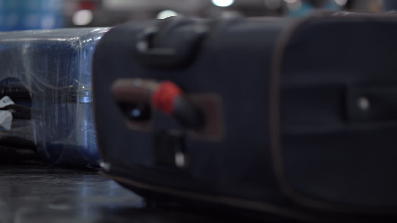 Luggage on moving conveyor at the airport