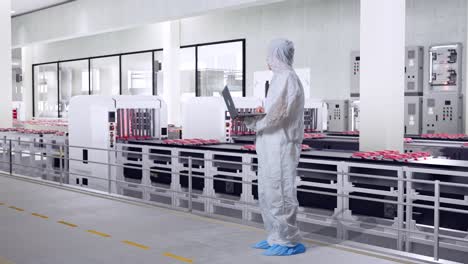 Meat Processing Plant Employee Working on Laptop