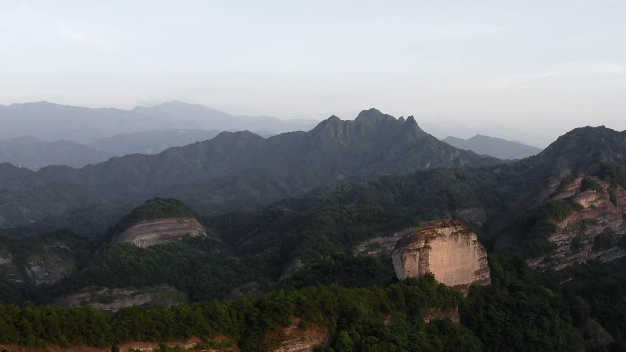 Sunset over Bajiao Shan mountain valley in China countryside, dramatic 4K aerial