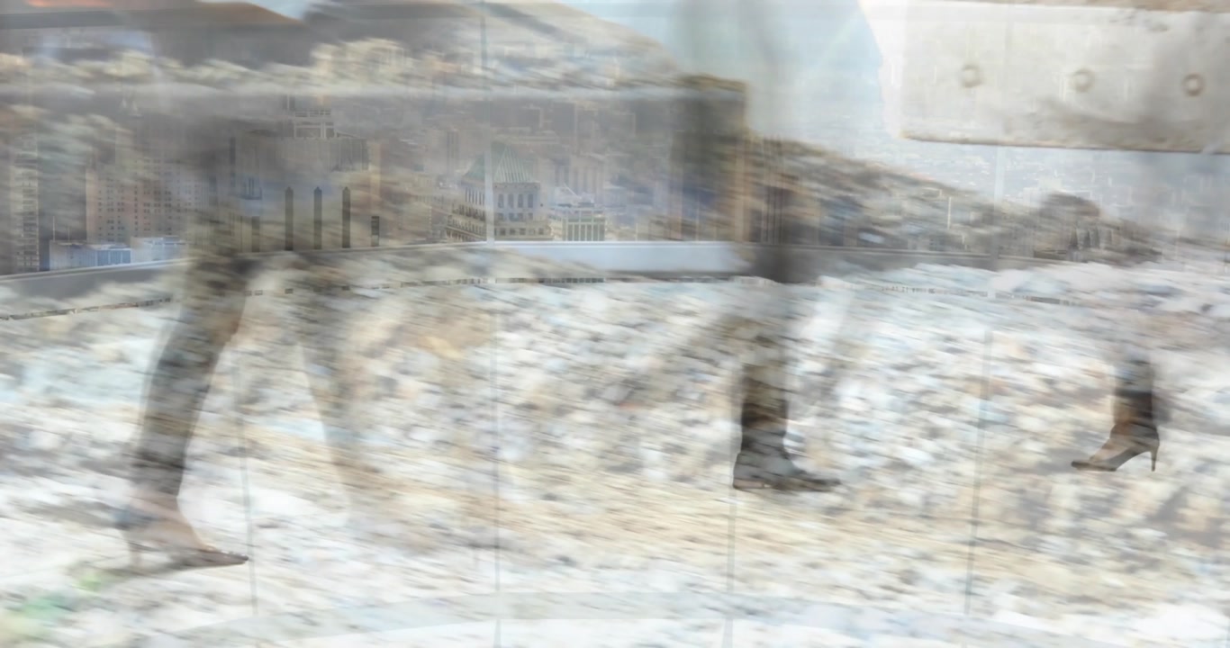 Group passing construction bucket to bypass rubble, ghosting overlay creating layered leg motion