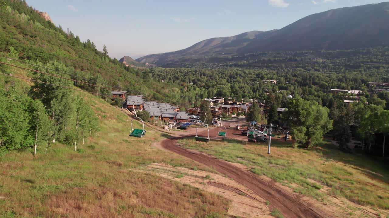 Empty chairlifts at ski resort in off-season, Aspen, Colorado 4K drone shot