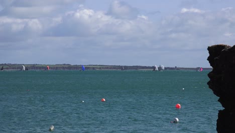 dunmore east yachts racing in the waterford estuary on a windy autumn morning