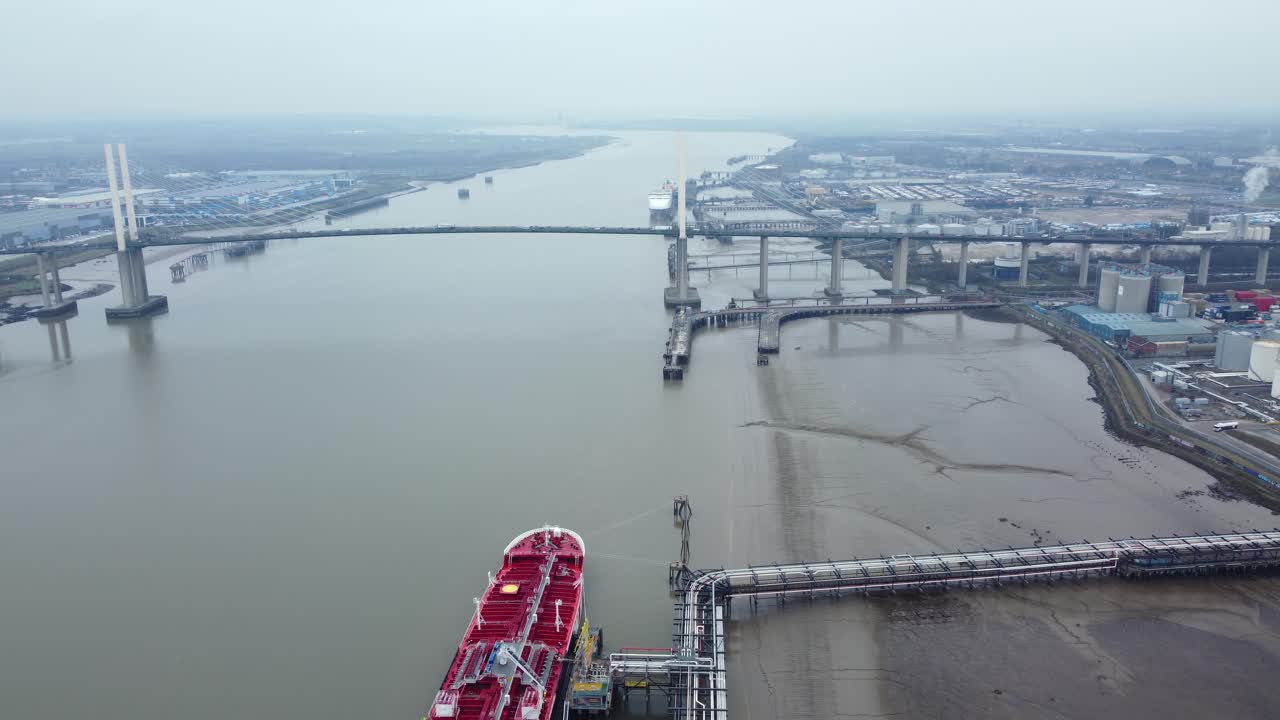 Aerial view of Queen Elizabeth II Bridge and a ship on the River Thames