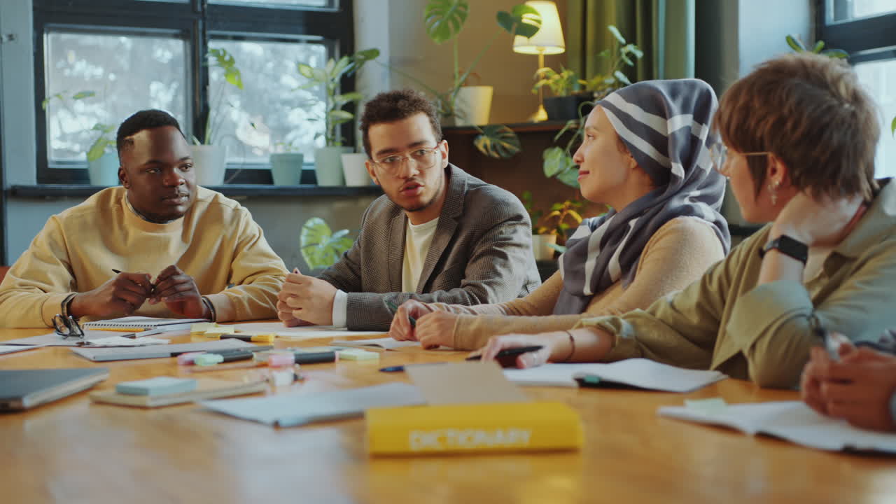 Multi-Ethnic Immigrant Students Having Discussion in Classroom