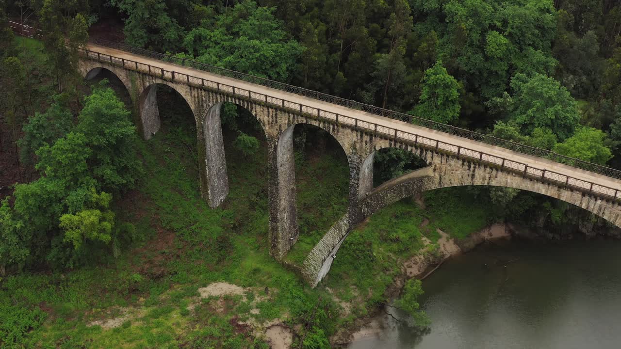 Aerial showcasing Po&ccedil;o de Santiago Bridge, in Sever do Vouga, Portugal
