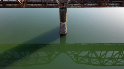 Aerial-view-of-a-Rail-road-bridge-on-Melton-Lake-in-Oak-Ridge,-Tennessee