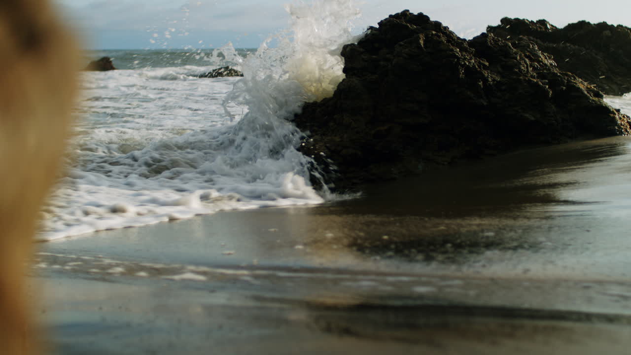 Close-up of Foamy Ocean Waves at the Shore
