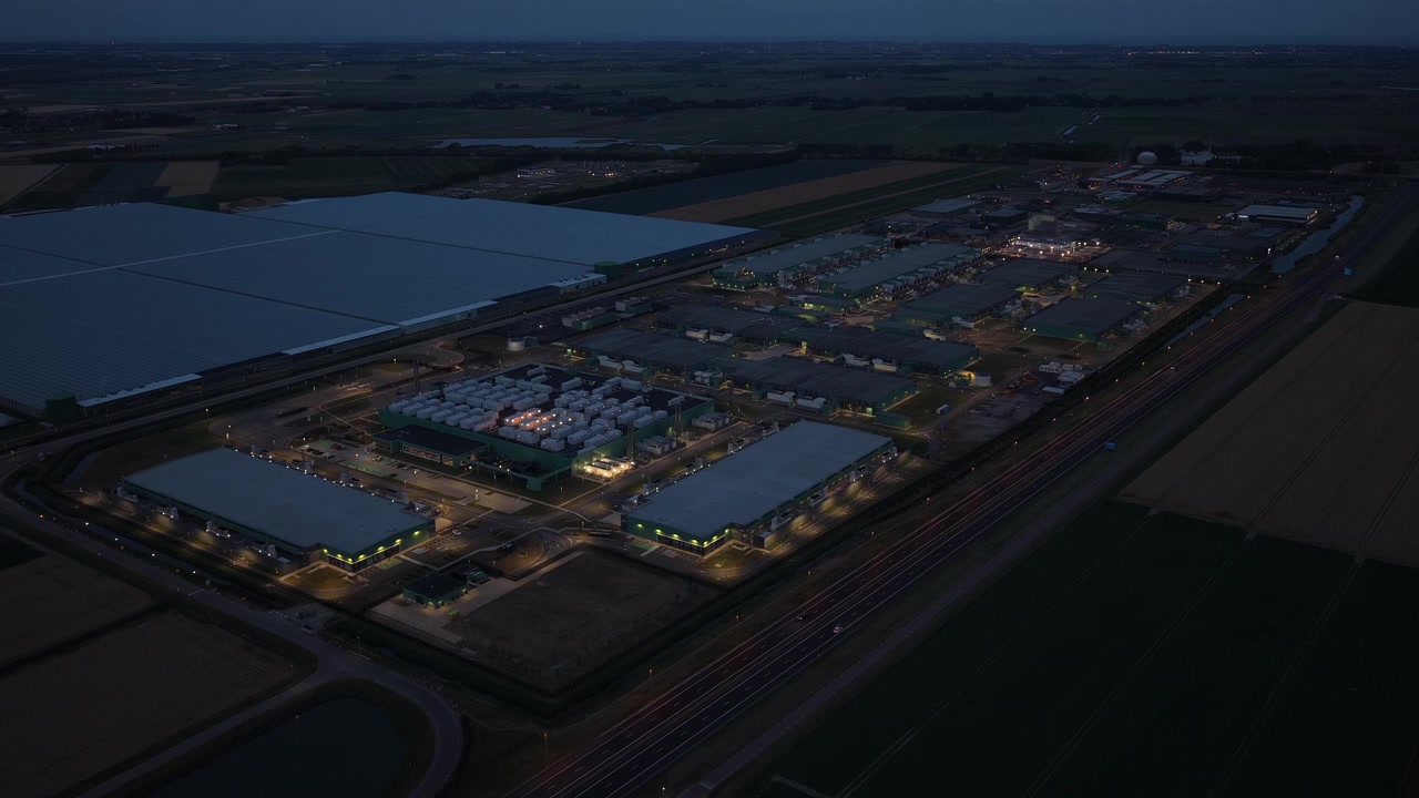 Hyperscale data center powering artificial intelligence at night