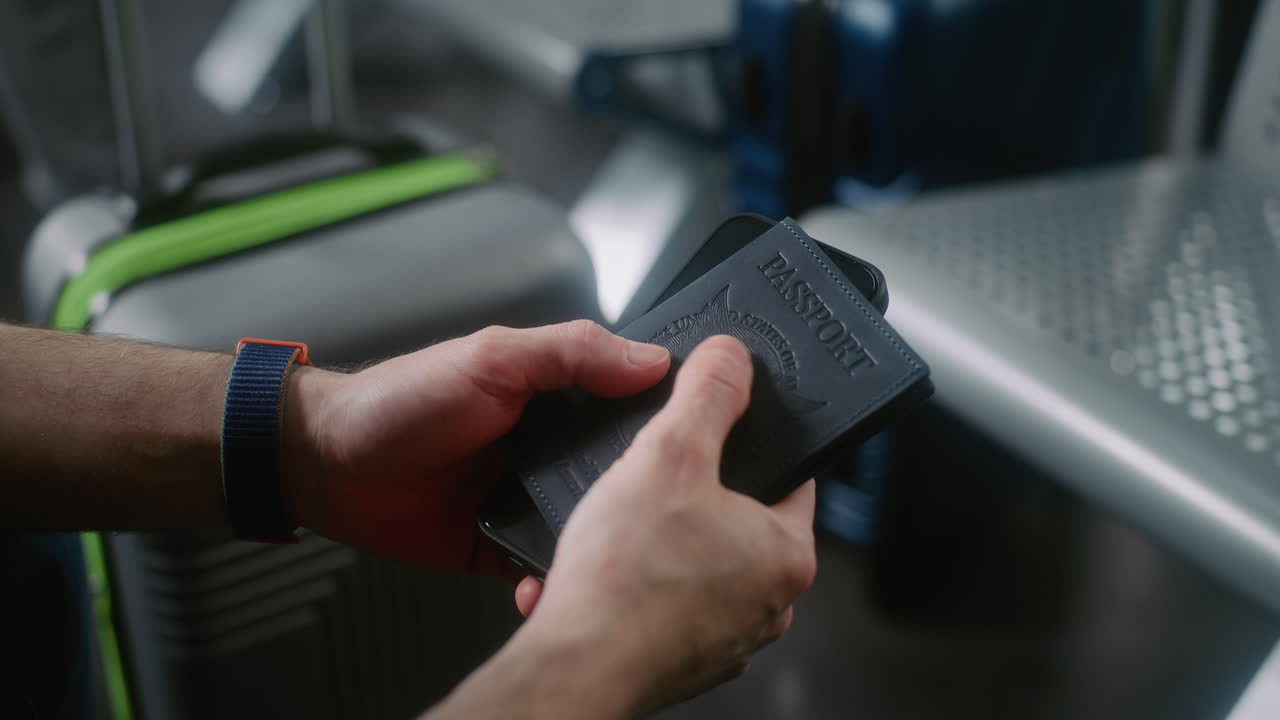 Person holding a passport at the airport