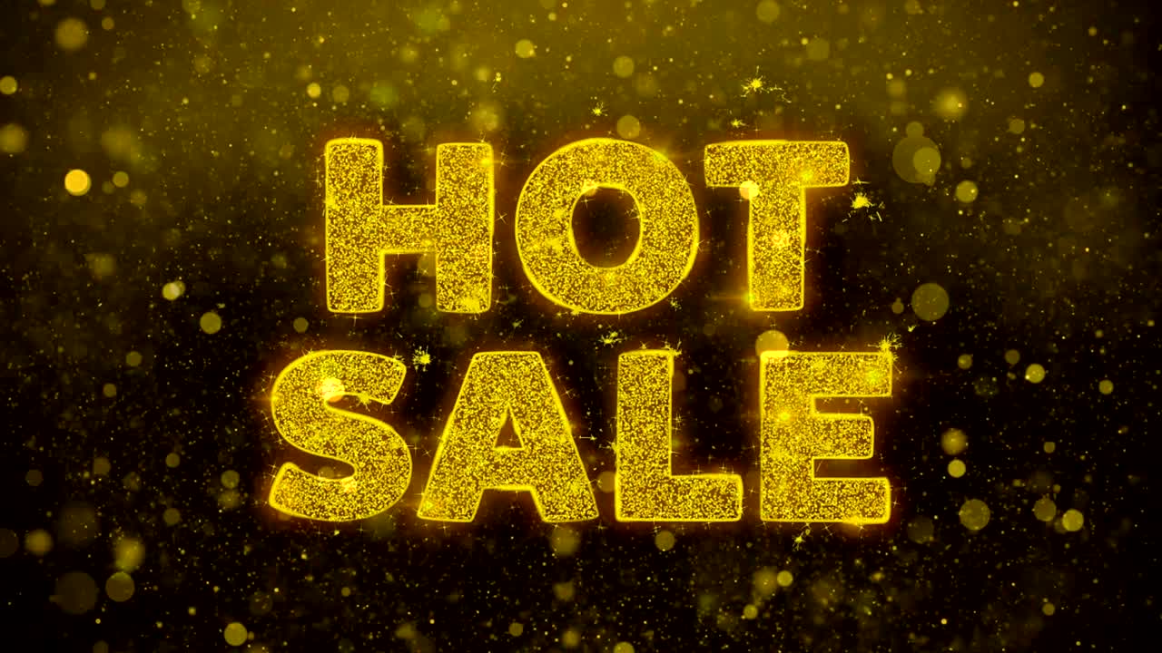 texto de venta caliente en la animación de partículas de brillo dorado.