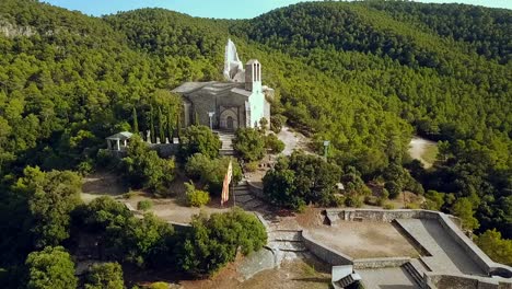 Aerial-view-of-the-castle-ruins-and-church-of-Vilademager-in-Catalonia,-Spain,-Europe