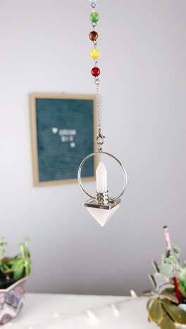 rose quartz crystal pendulum with chakra beads