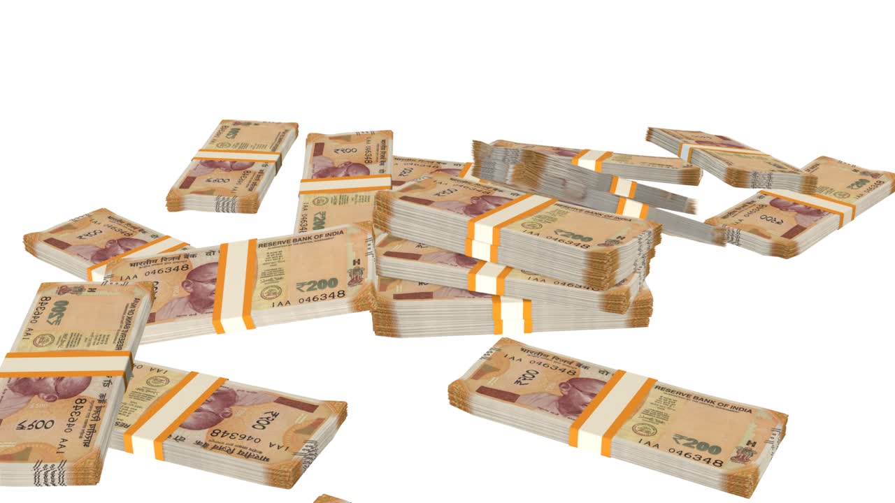 Many wads of money falling on table. 200 Indian Rupees banknotes.