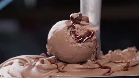 scoping ice cream in slow motion close up side view