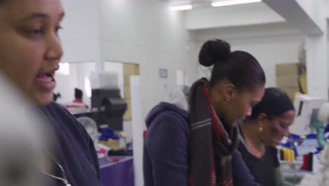 Group-of-mixed-race-women-working-in-factory