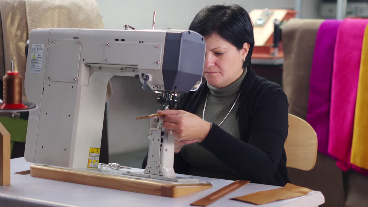 Woman sewing with a sewing machine