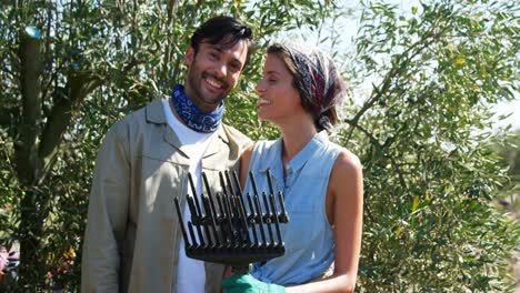 Portrait-of-smiling-couple-in-olive-farm-4k
