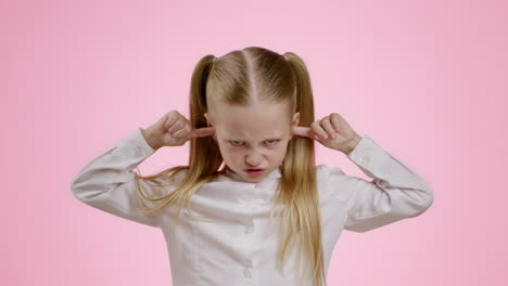 Upset Girl Covering Ears