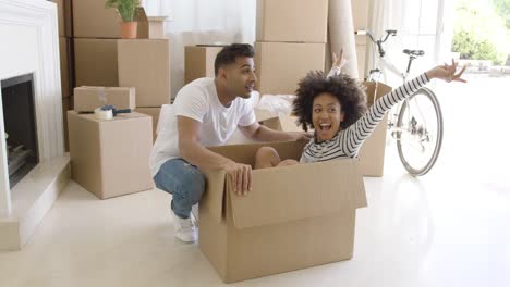 happy young couple moving house together