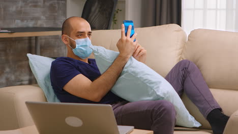 bored man wearing a mask during lockdown