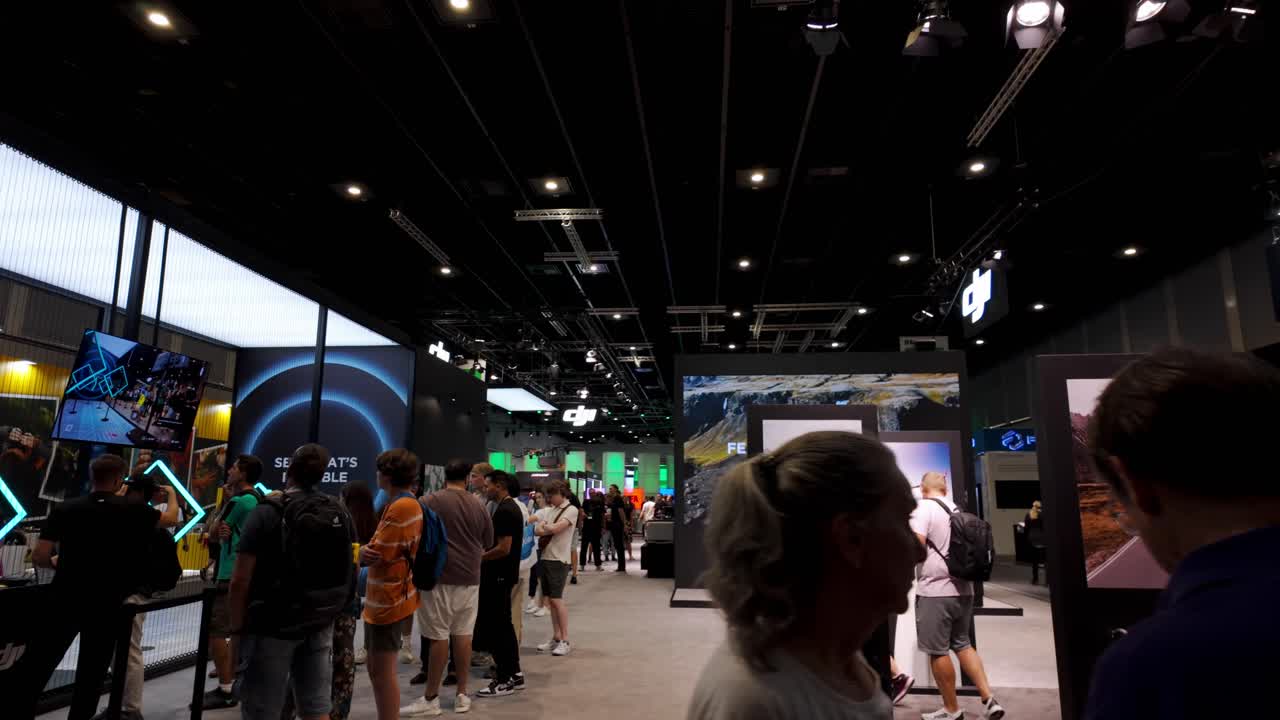 People attending the IFA Berlin exhibition, showcasing the latest in consumer electronics and home appliances at Messe Berlin, Germany.