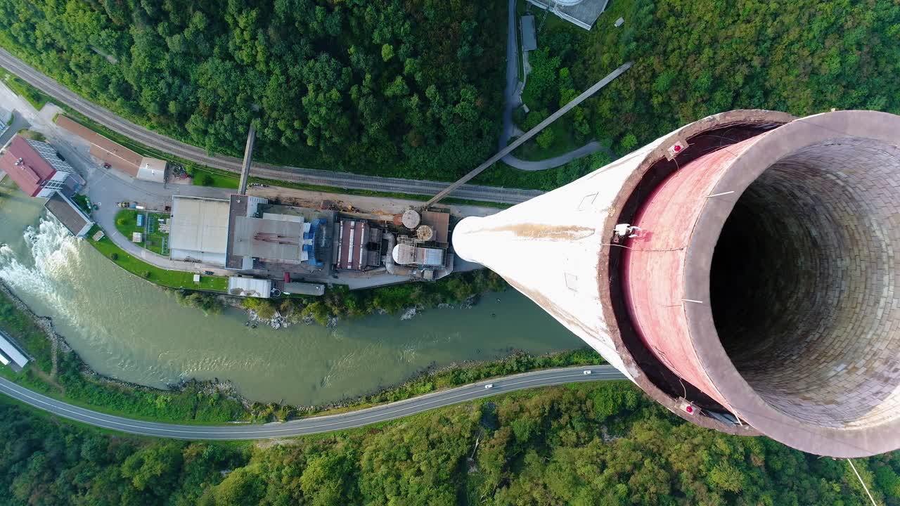 Aerial drone flyover chimney of Trbovlje power station, Slovenia