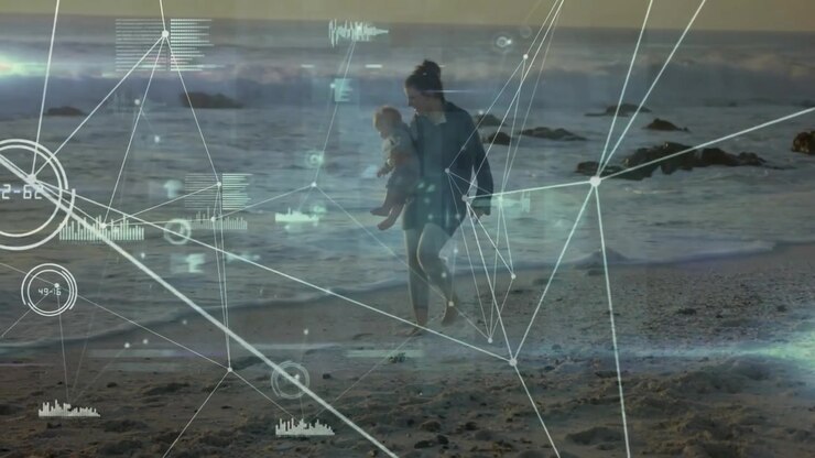 Mom carrying baby walking shore, health AR overlaying gauges while adjusting hold protecting child