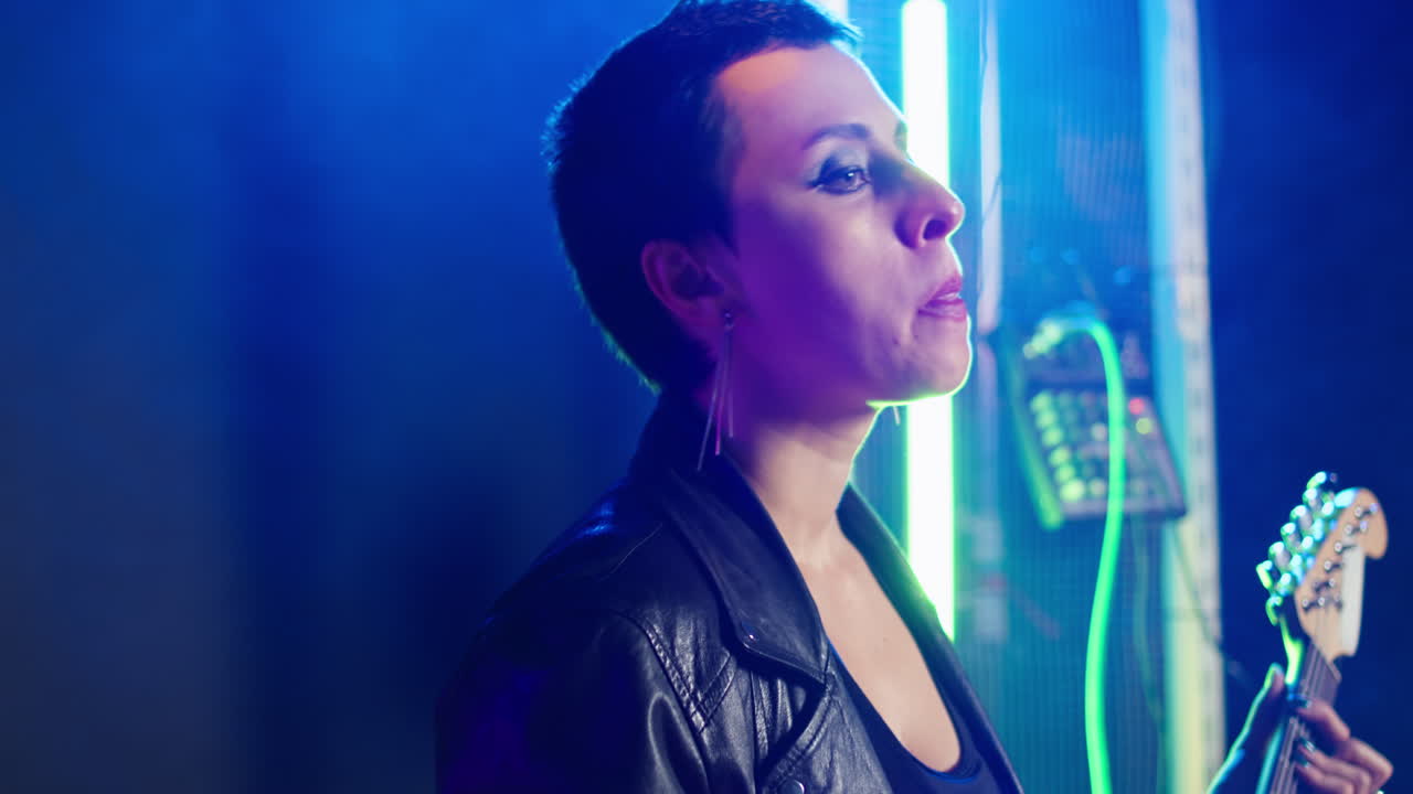 Punk Rock Musician Blowing Bubblegum on Stage