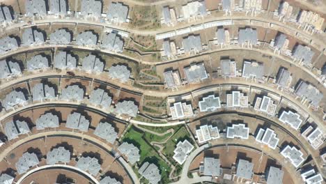 aerial shot of a group of modern, high-rise buildings in a luxury residential complex in riva, istanbul