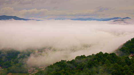 aerial drone sweep through timeless mist in the smokies