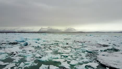 iceland jökulsárlón iceberg floating in sea, glacier melting