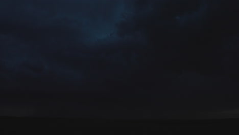 dark stormy night sky with heavy clouds
