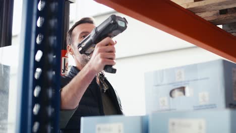 adult caucasian man working in warehouse.