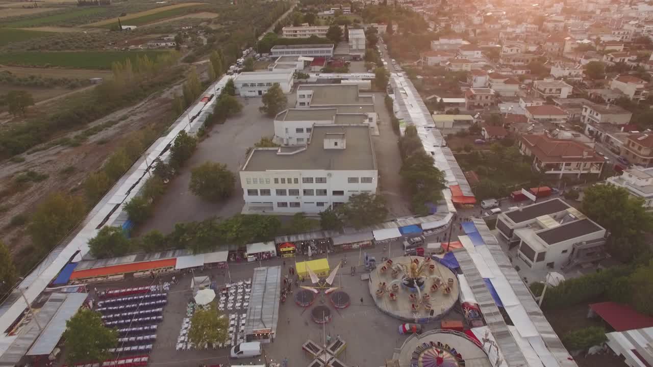Aerial View of a Town Fair at Sunset