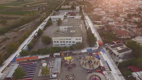 aerial view of a town fair at sunset