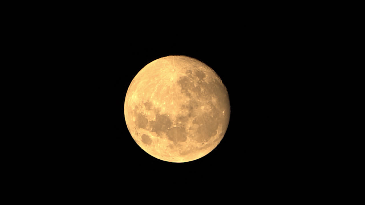 Time Lapse Of Large Orange Full Moon Glowing Bright