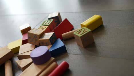 wooden-toy-cubes-for-children-on-the-ground