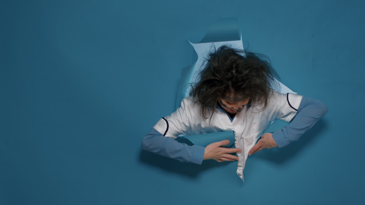 Goofy crazy female scientist grinning and smiling on camera