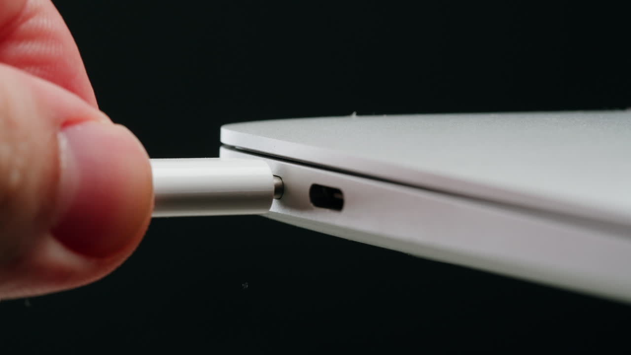 USB-C Cable Connecting to Laptop