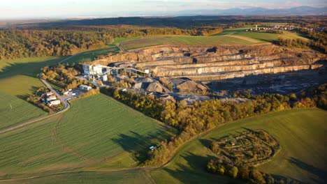 aerial view of stone quarry site in autumn in spectacular drone