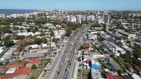 aerial view of montevideo, uruguay, showcasing the urban landscape and traffic navigating a major avenue