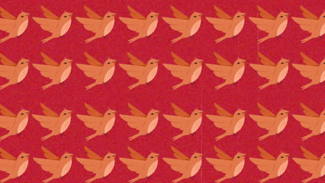 animación de varios pájaros naranjas sobre fondo rojo