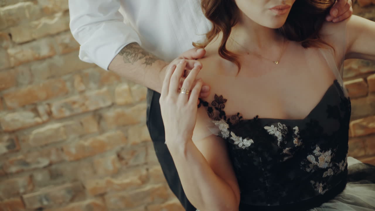 Couple at festive table. Young couple having date in evening outfits in luxury restaurant