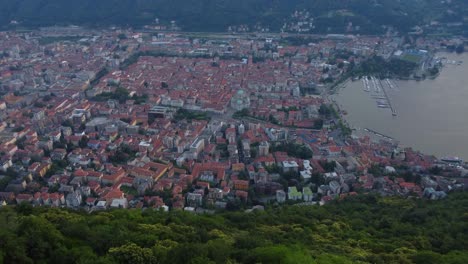 aerial drone video of views overlooking como city and lake como